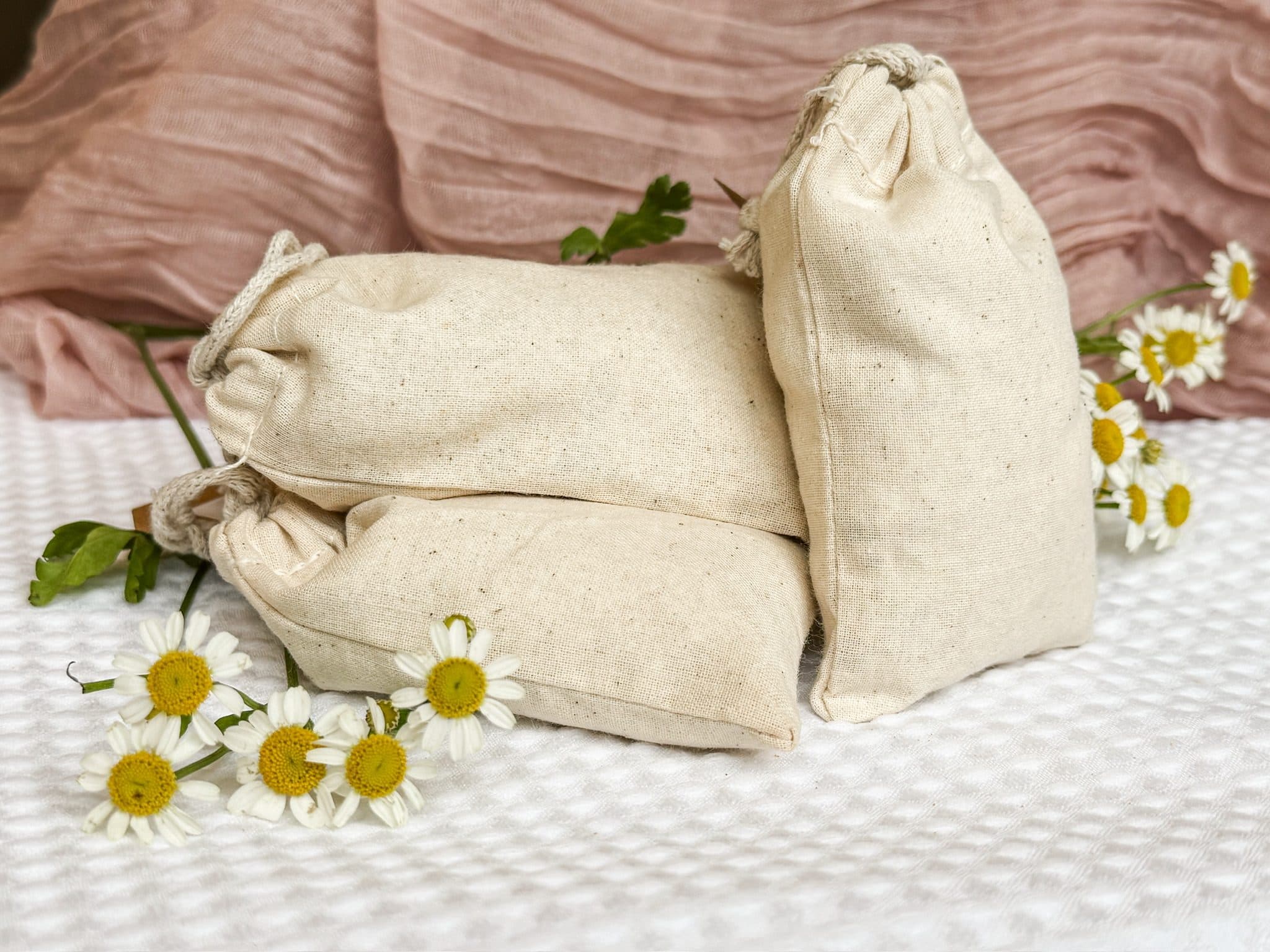 Oatmeal bath soaks on pink linen